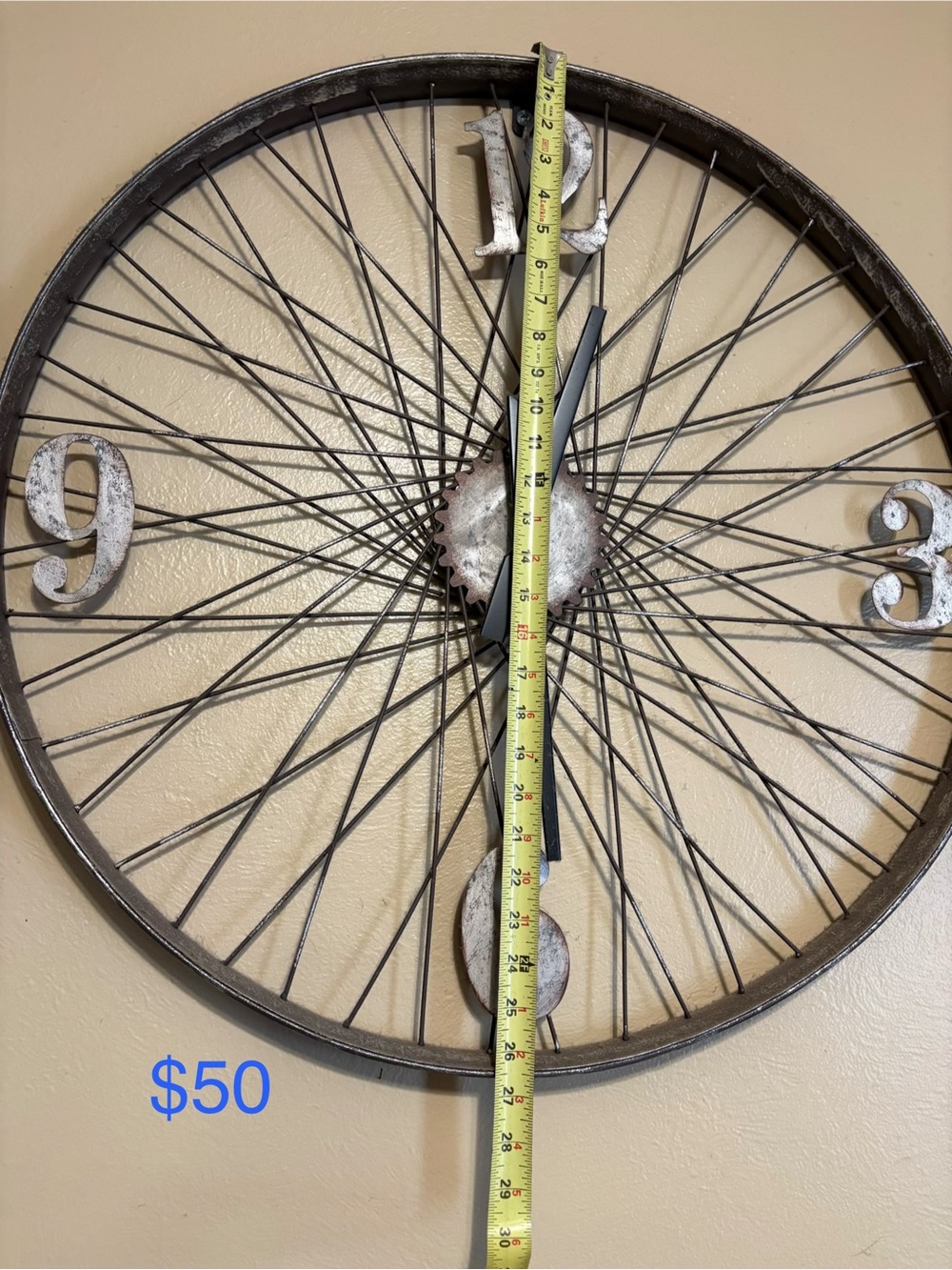 Rustic Metal Bicycle Wheel Wall Clock in Brown